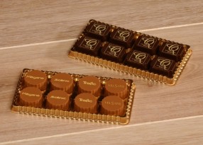 Bedrukte pralines in transparant doosje